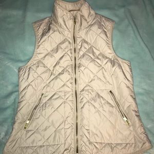 Cream colored vest!